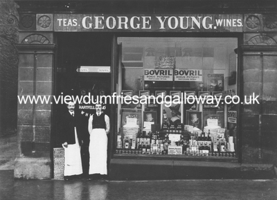George Young, shop and staff