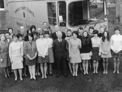 Ewart Library staff with a mobile library
